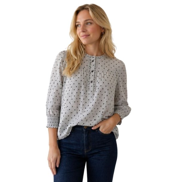 Fransa bluse med prikker og fl�sedetaljer