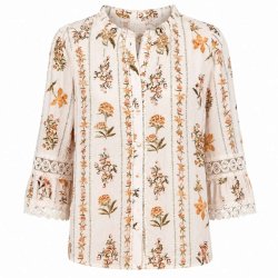In April 1986 creme skjorte med blomsterprint og blondedetaljer